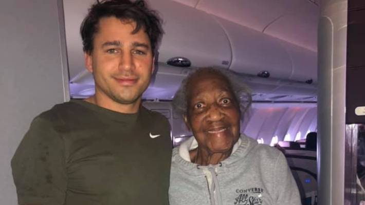 Man offers business Class seat 80 Year Old Woman