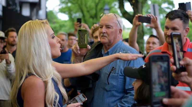Tomi Lahren had a drink thrown over Her in a feast, Now it had turned Political involving Donald Trump.